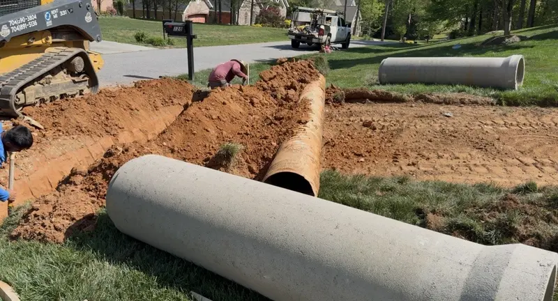 Graded sub-base and forms set for a long driveway pour